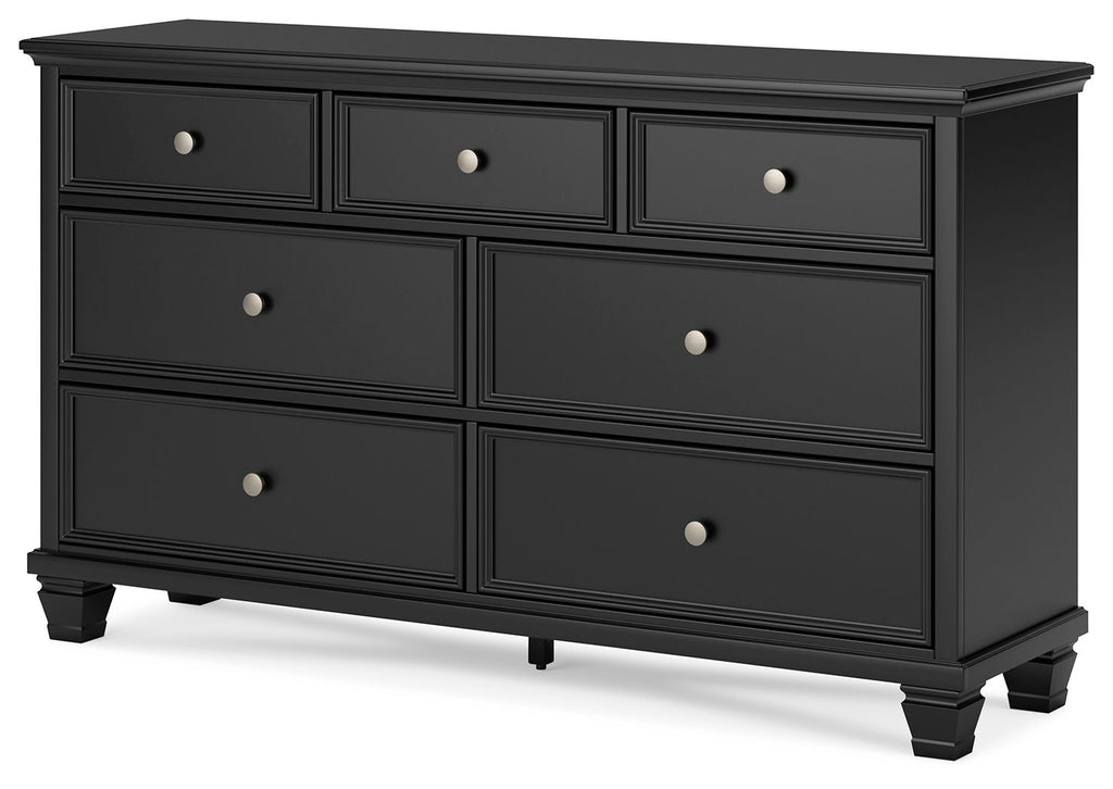 Black dresser with six drawers and round silver knobs, rectangular frame, tapered feet