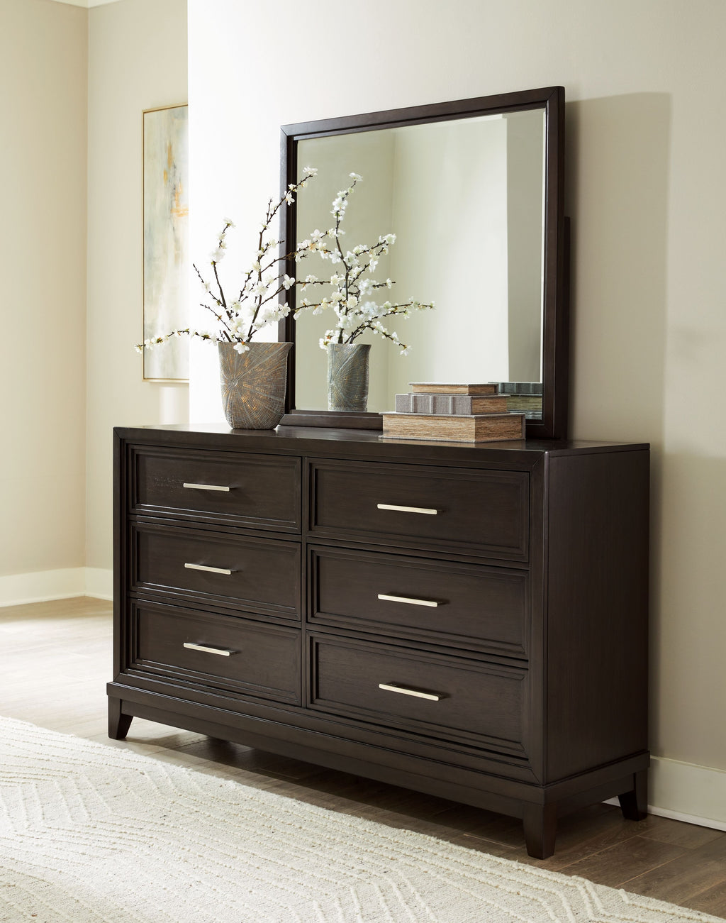 Dark grayish brown dresser with framed rectangular mirror and six drawers