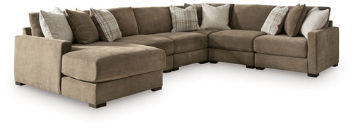 Coffee-brown sectional sofa with chaise corner and track arms, shown from side angle