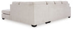 Light gray fabric sectional sofa with track arms and box cushions