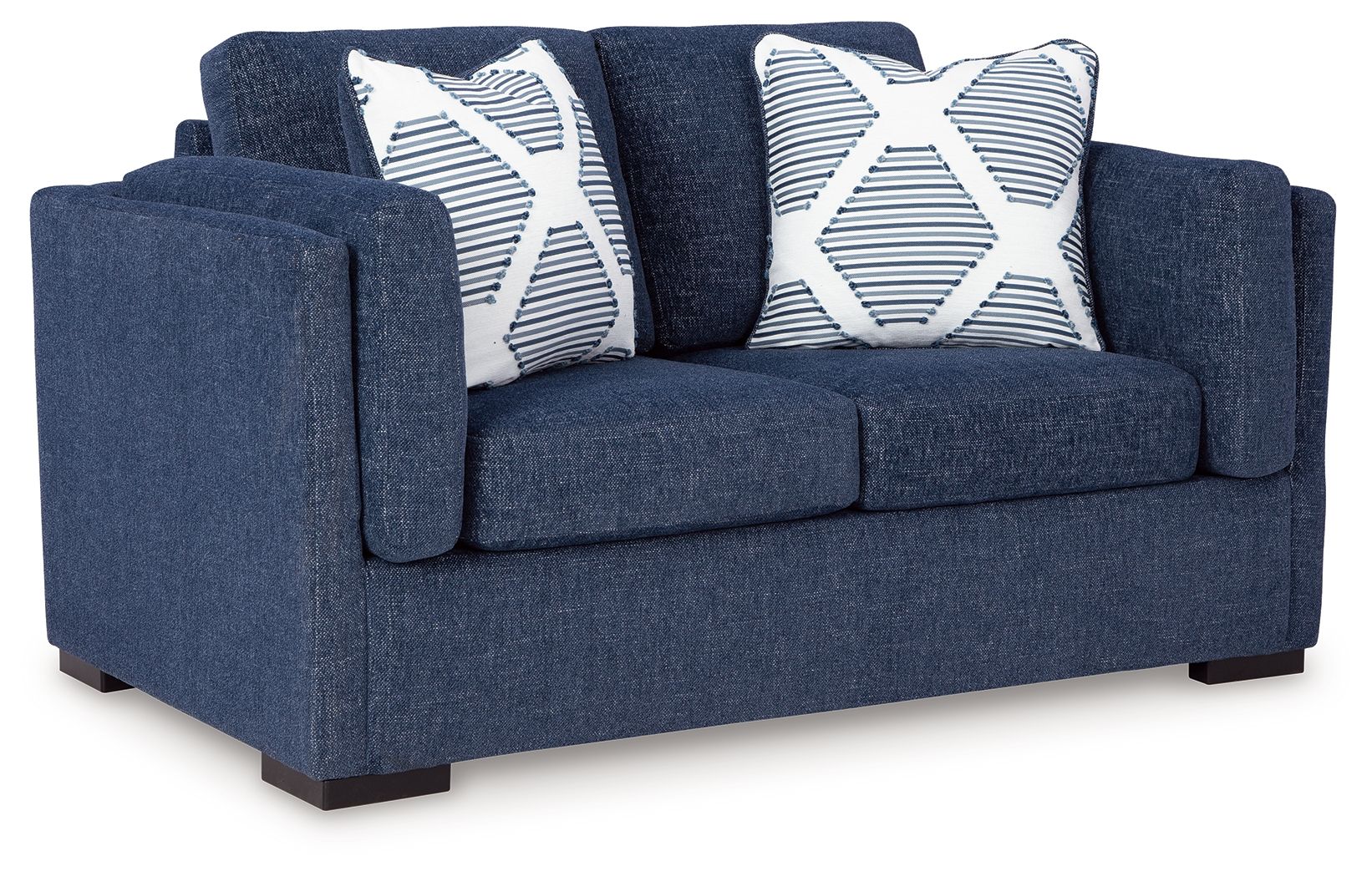 Blue loveseat sofa with two white-and-blue striped throw pillows and rounded arms
