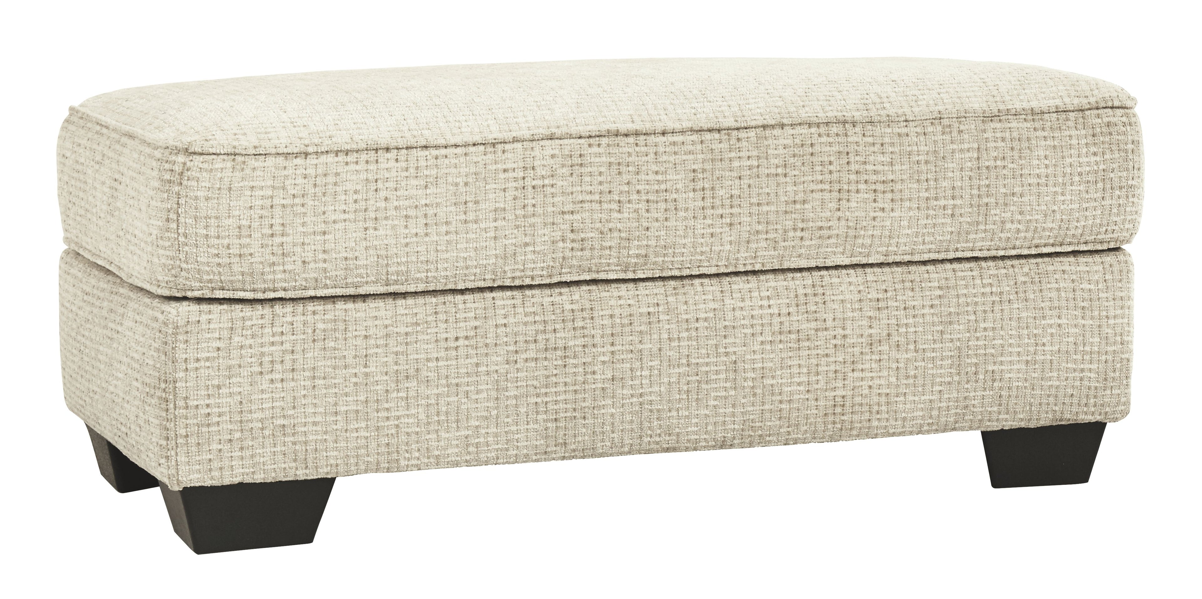 Sandstone upholstered ottoman with cushioned top and dark tapered legs