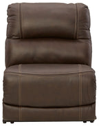 Chocolate brown armless power recliner with adjustable headrest, padded back and sides