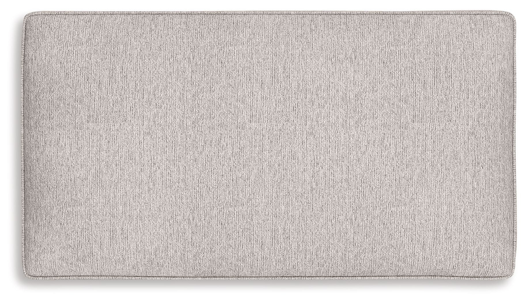 Sandstone fabric ottoman with rectangular padded top and stitched edges