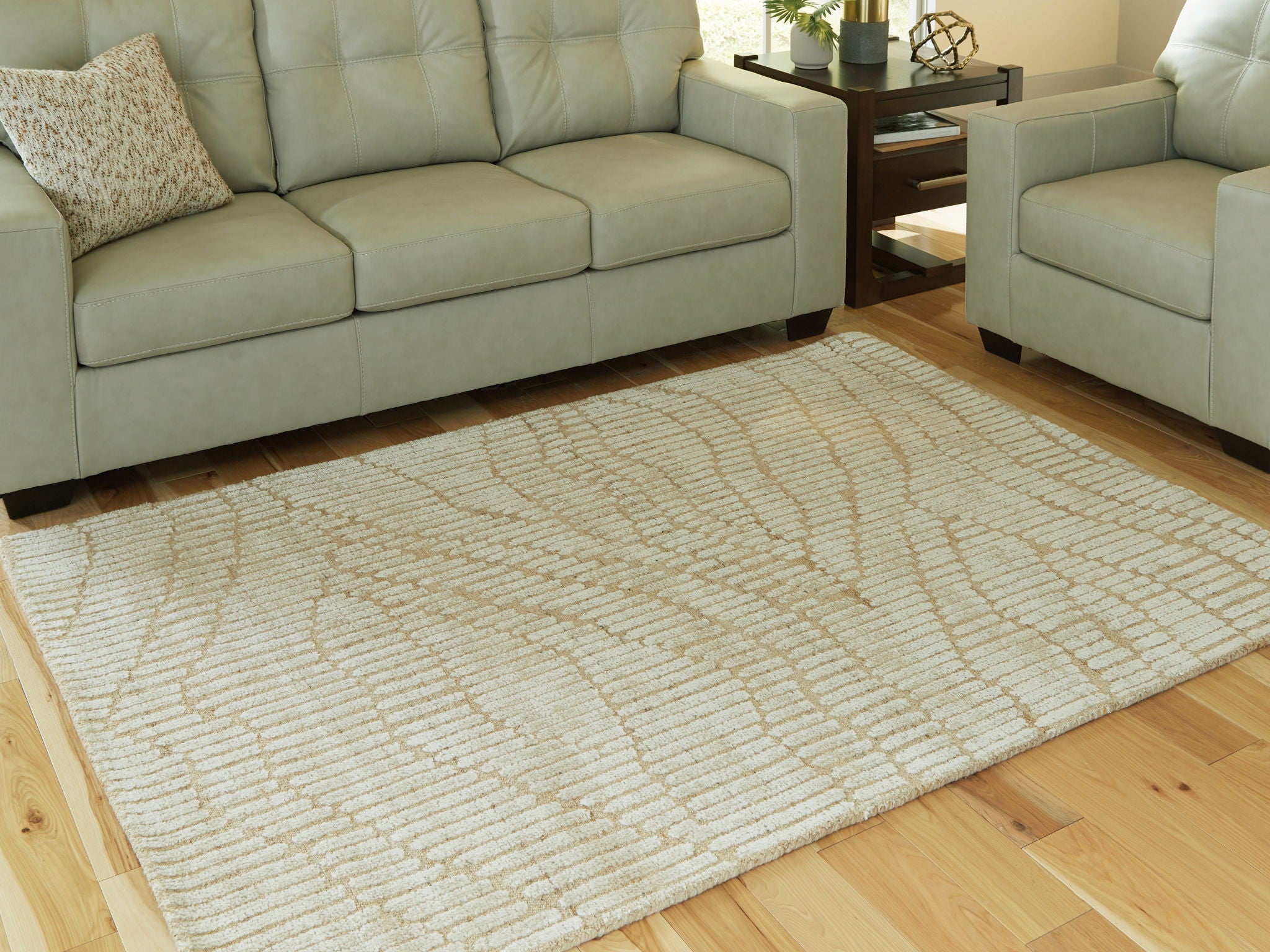 Beige area rug with wavy line texture and plush loop weave
