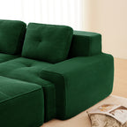 Green corduroy modular sectional sofa arm and seat cushions, ottoman section