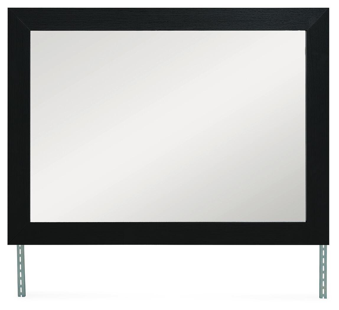 Black rectangular bedroom mirror with dark frame and metal support legs