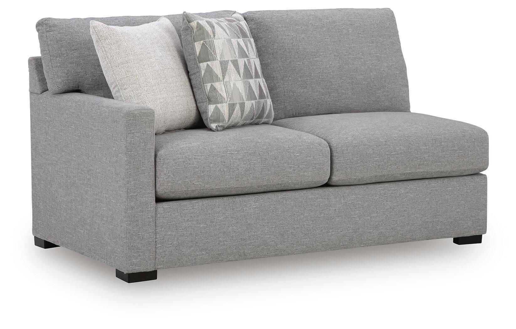 Pewter gray left-arm sofa with two seats, armrest, and patterned throw pillows
