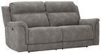 Power reclining sofa, dark slate gray upholstery, tufted back cushions and padded arms