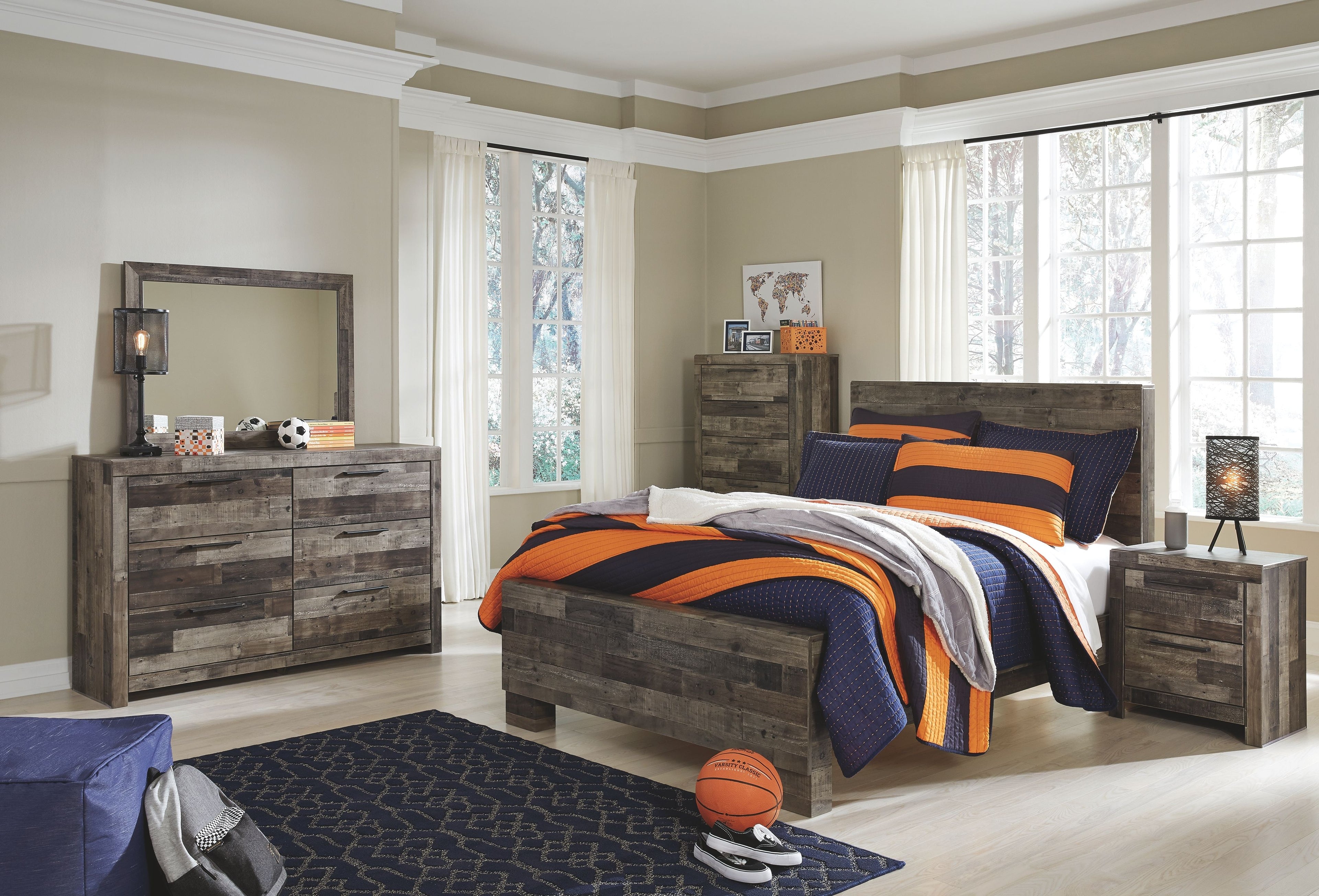 Youth panel bedroom set with dark wood bed, dresser with mirror, and paired nightstands