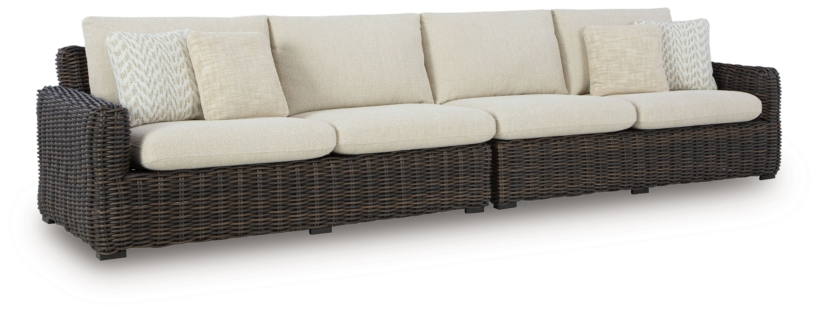 Dark brown wicker loveseat with beige seat and back cushions, removable throw pillows