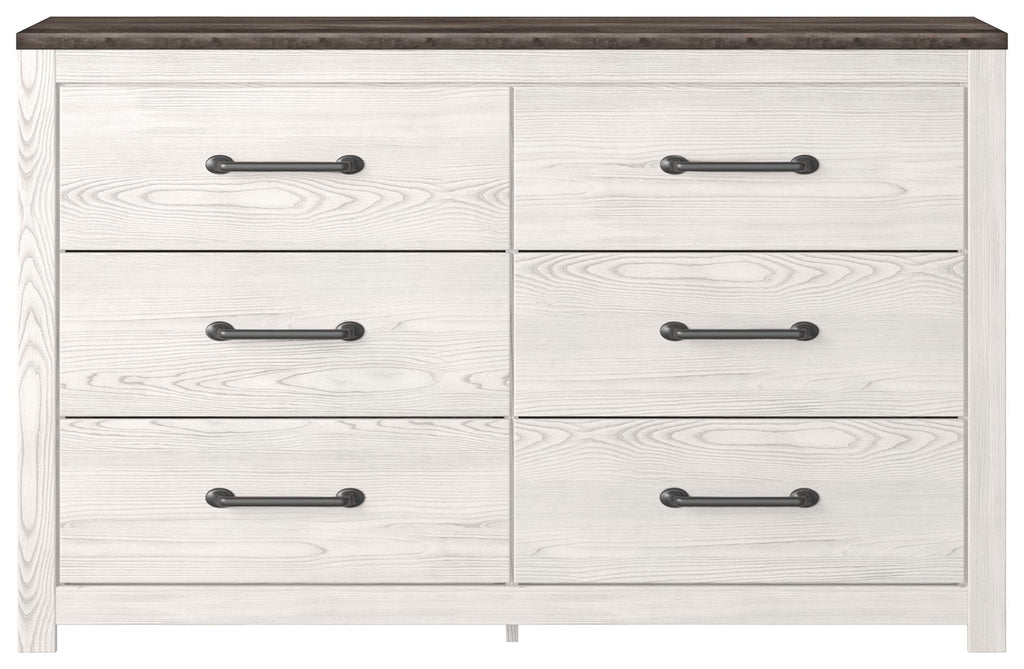 White wood dresser with six drawers and black bar pulls, dark wood top