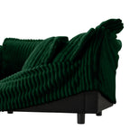 Green sectional sofa arm and seat corner with ribbed fabric and rounded base