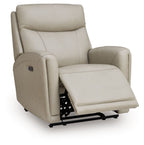 Bone power recliner chair with extended footrest and padded headrest, side view