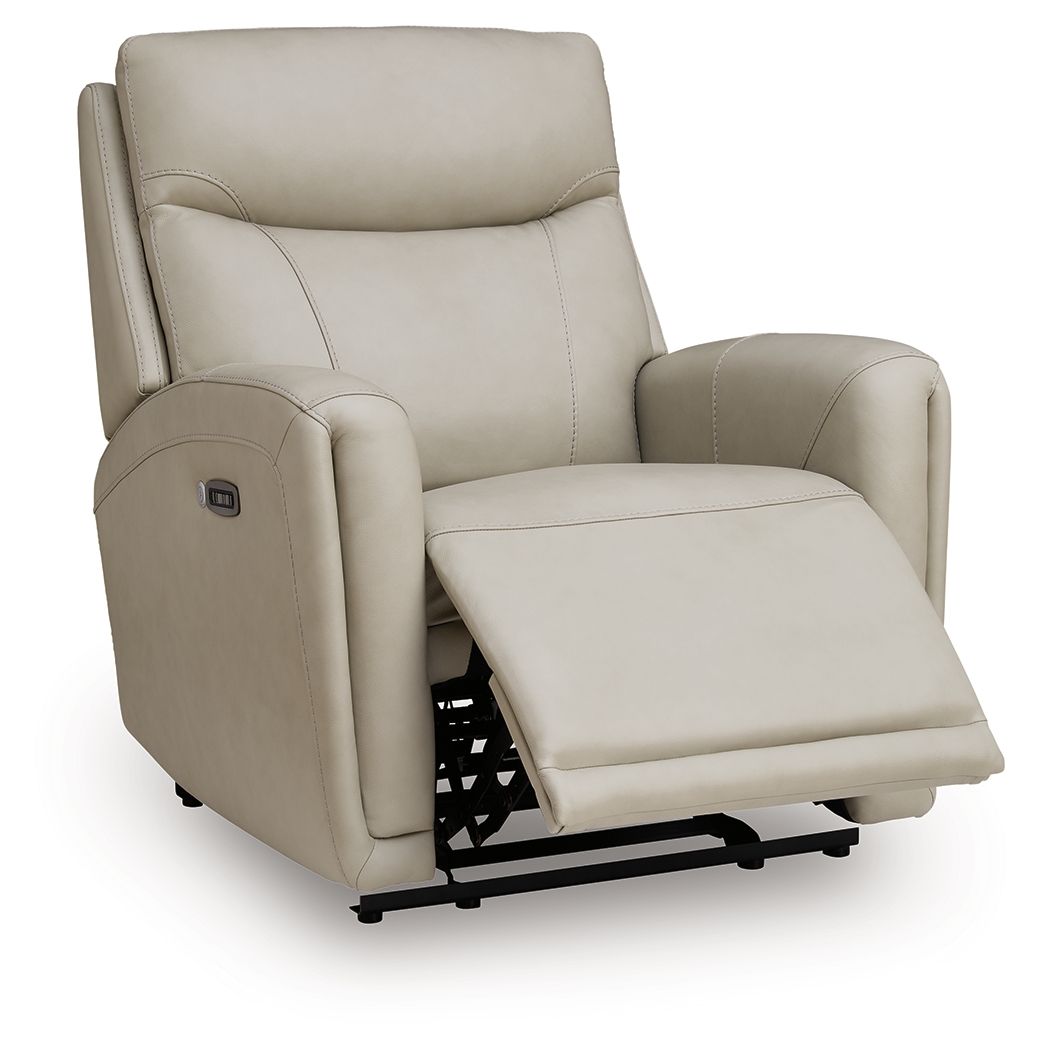 Bone power recliner chair with extended footrest and padded headrest, side view