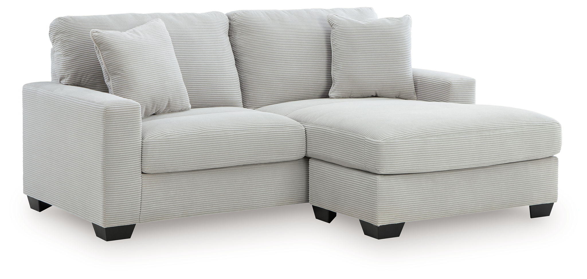 Gray sofa chaise with four back cushions and a chaise ottoman extension