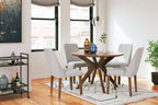Dining table set with round wood table and four light gray upholstered chairs