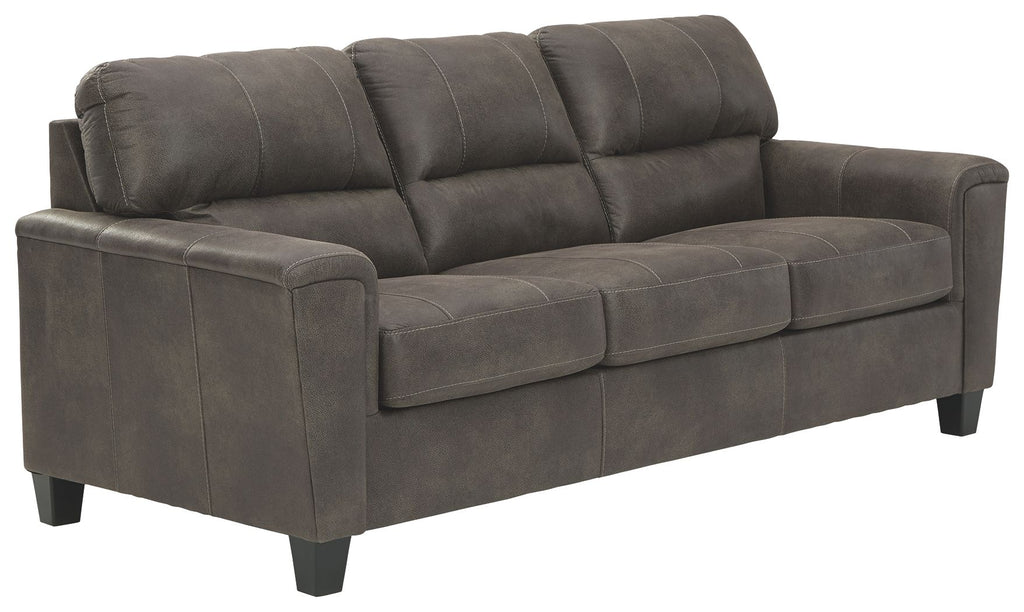 Gray stationary loveseat sofa with tufted back, padded arms, and three seat cushions