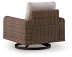 Woven swivel lounge chair with gray back cushion, dark brown arms, round black base