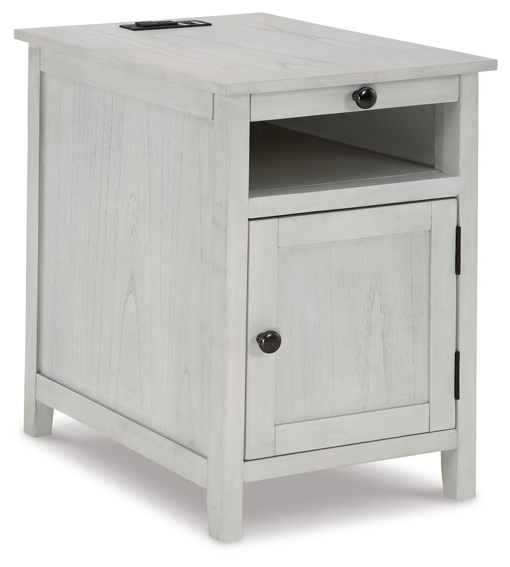Light beige chair side end table with open shelf, cabinet door, and round drawer pull