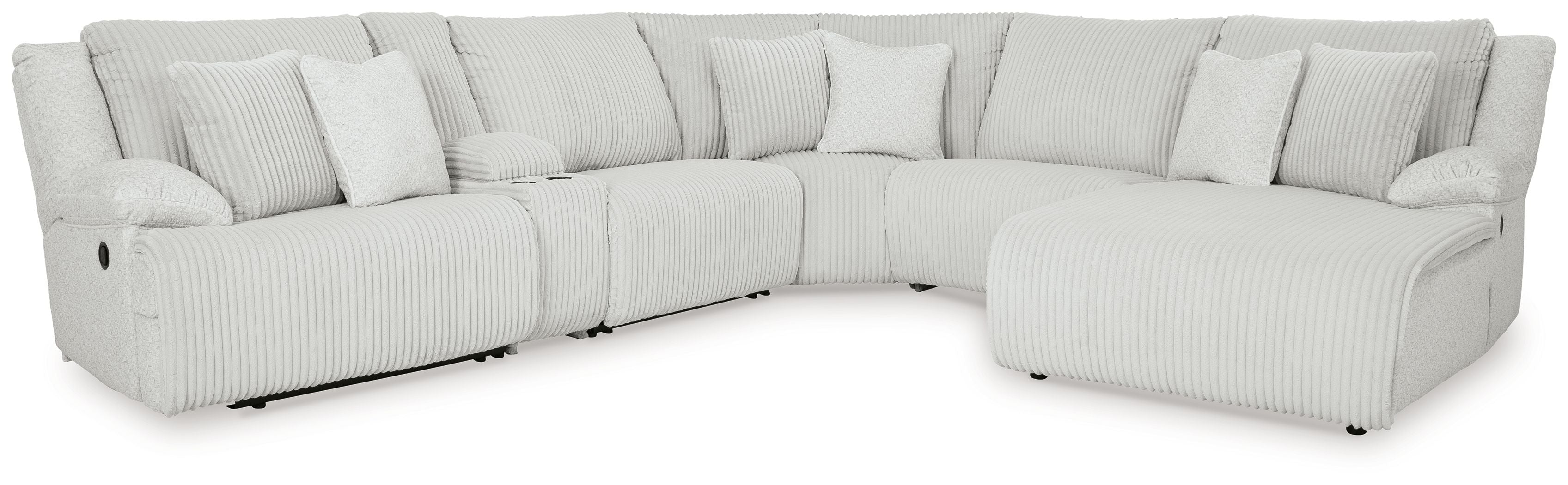 Light gray reclining sectional with chaise, ribbed upholstery, and multiple back pillows