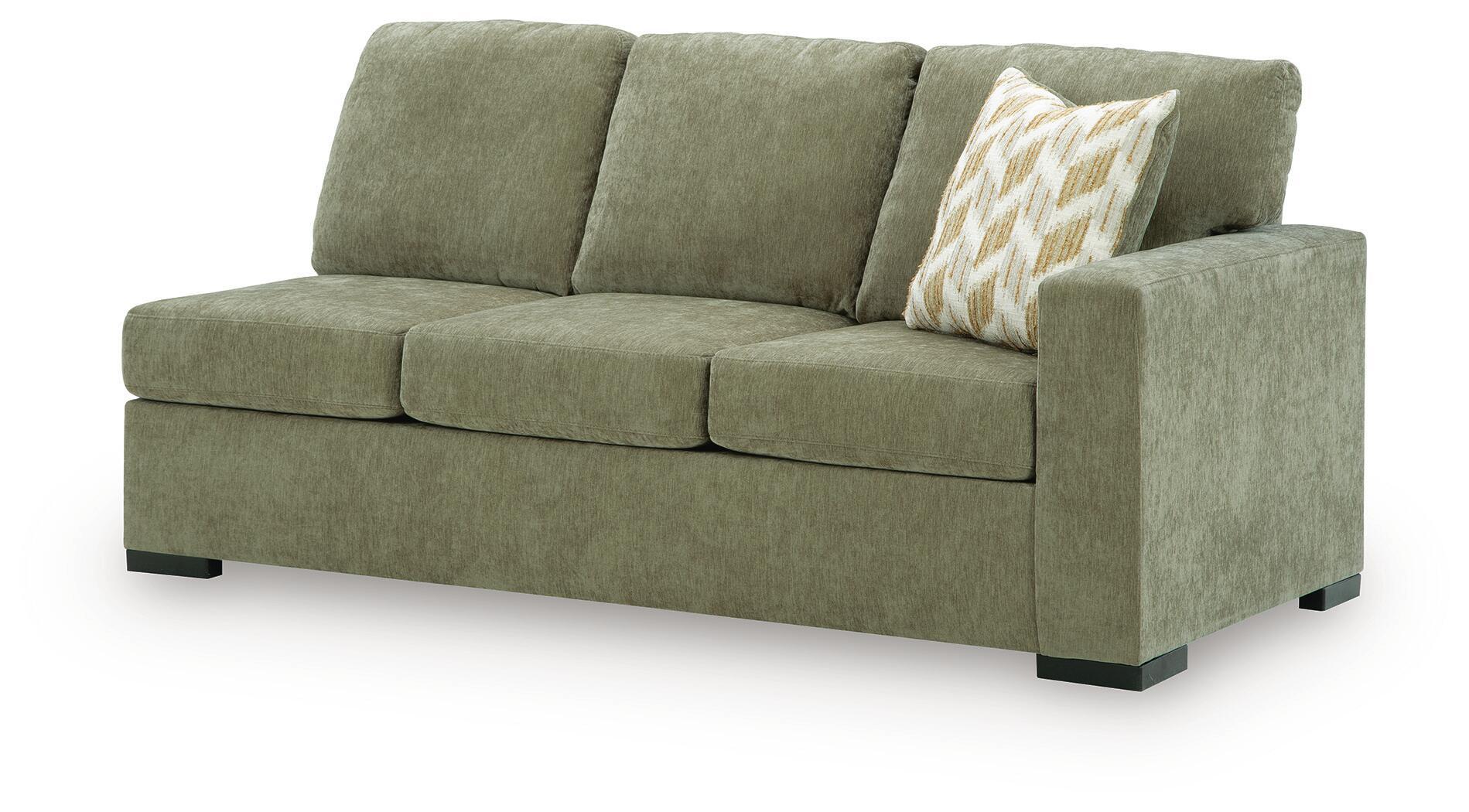 Moss green sofa sleeper with three seat cushions, tufted back, and patterned accent pillow