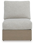 Armless chair with cushion, light gray upholstered back and seat on brown base