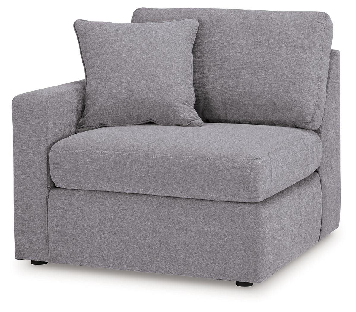 Granite gray upholstered corner chair with large seat cushion and two pillows