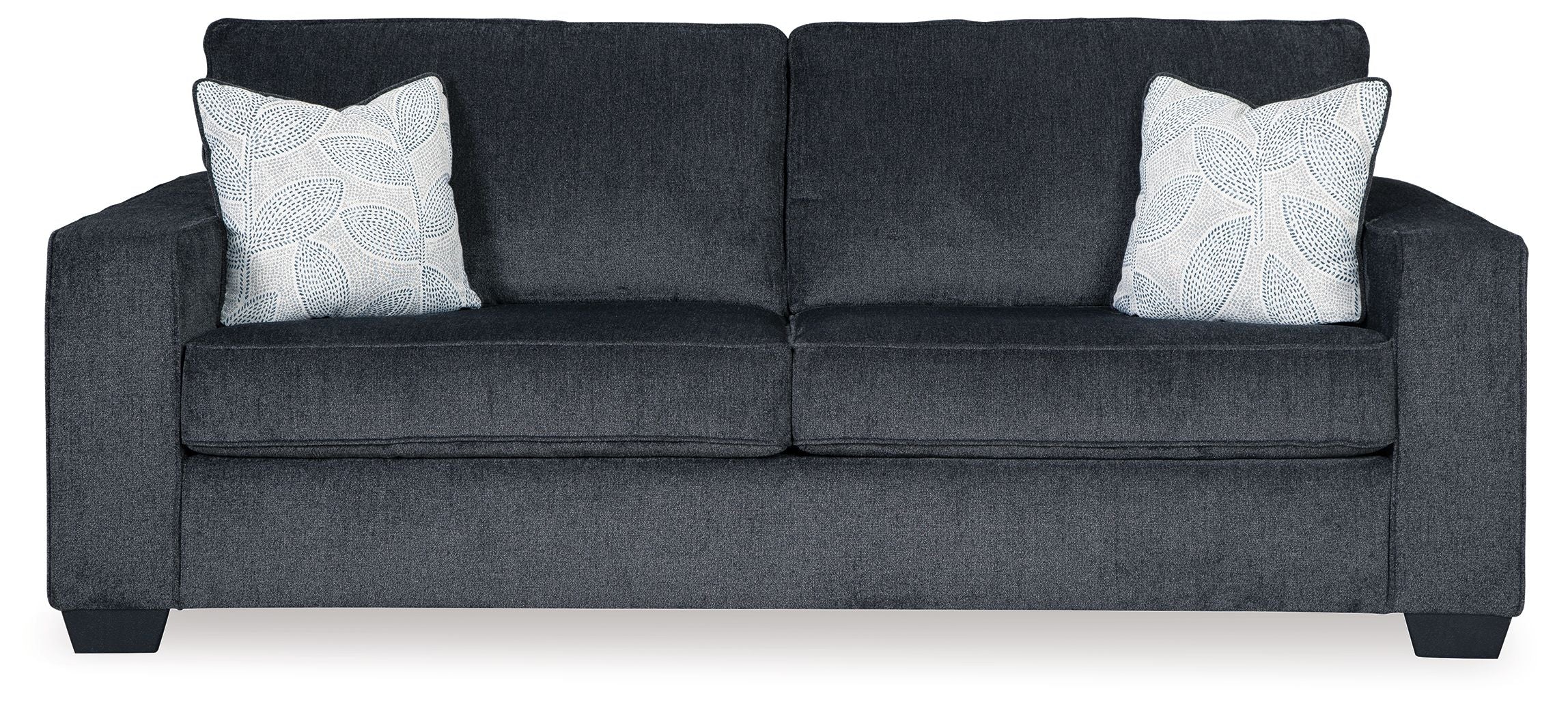 Slate stationary sofa with square arms, tufted back, and two light patterned throw pillows