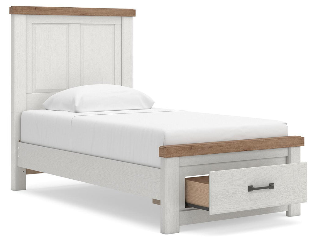 White panel storage bed with wood headboard trim and under-bed drawer storage, side view