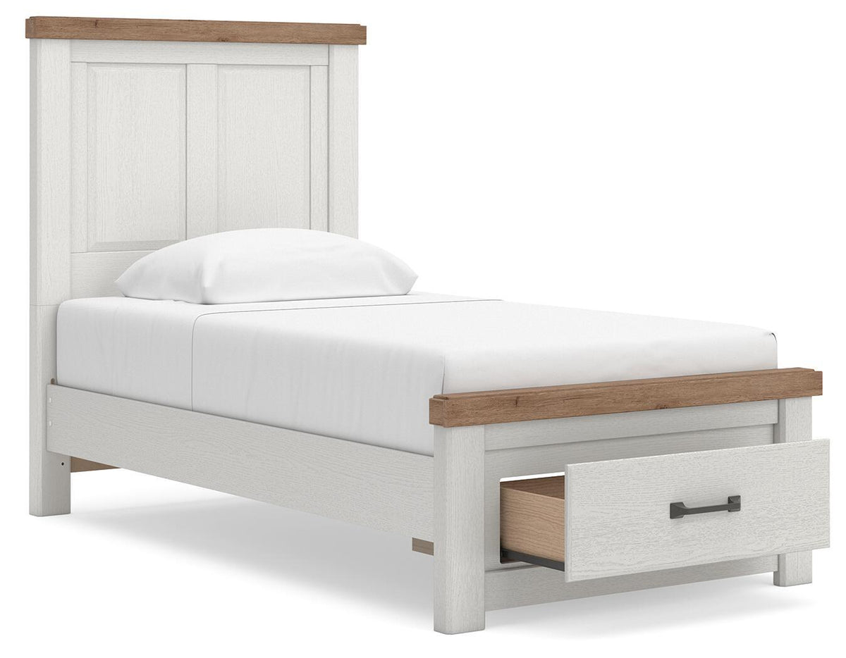 White panel storage bed with wood headboard trim and under-bed drawer storage, side view