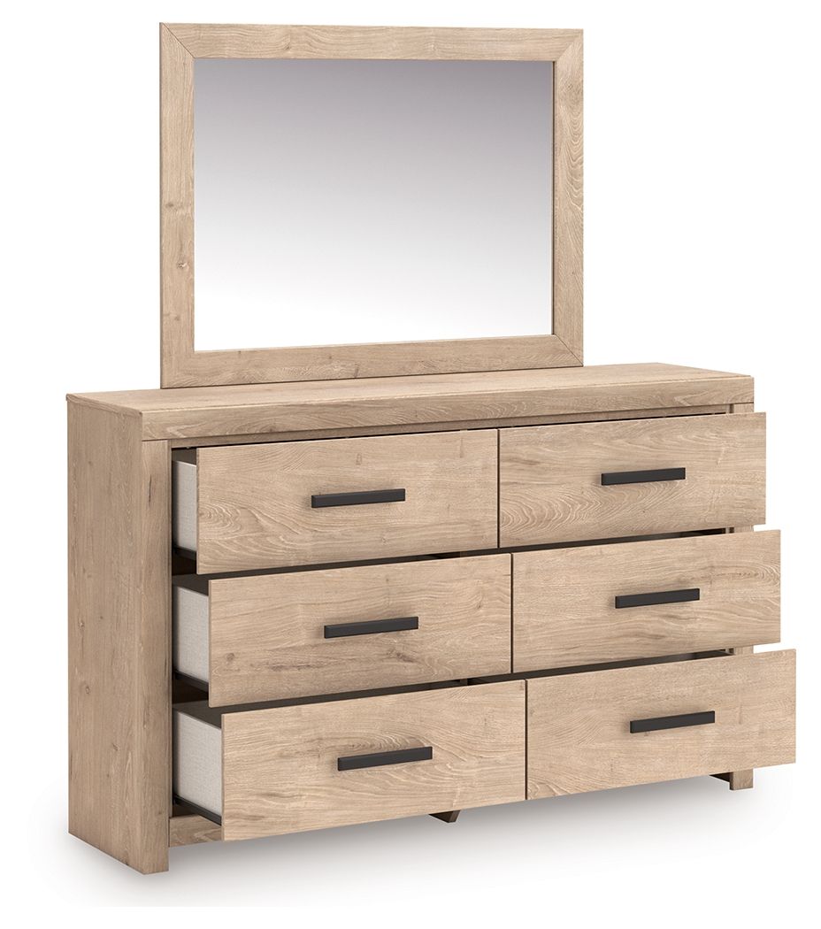 Tan dresser with mirror, six drawers with open middle drawers, black bar pulls