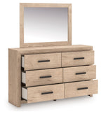 Tan dresser with mirror, six drawers with open middle drawers, black bar pulls
