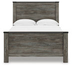 Gray wood panel bed with headboard, two white pillows, and white-sheeted mattress