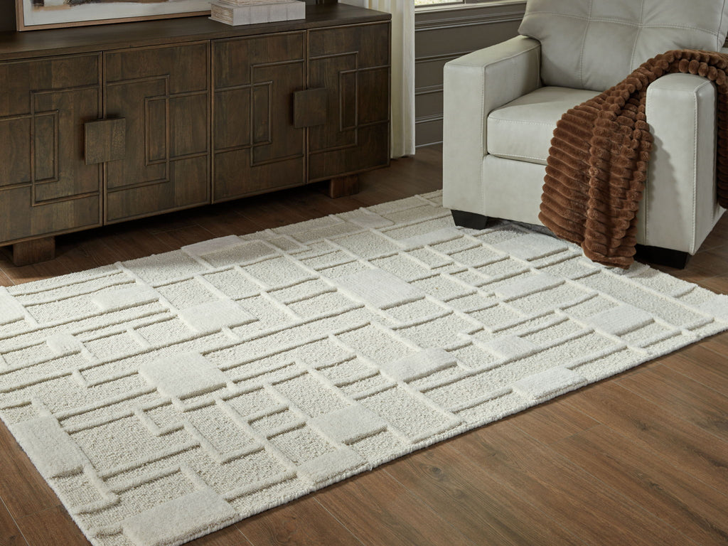 Empriss beige rug with raised block geometric pattern, flat woven texture