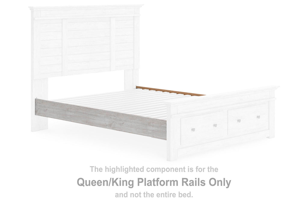 Whitewash platform bed rails with rectangular panel detailing