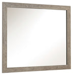 Rectangular bedroom mirror with light gray distressed frame