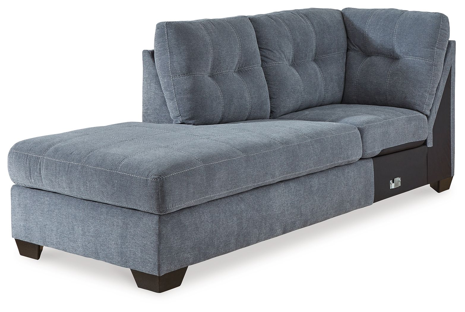 Blue denim corner chaise with tufted back, track arms, and dark wooden legs