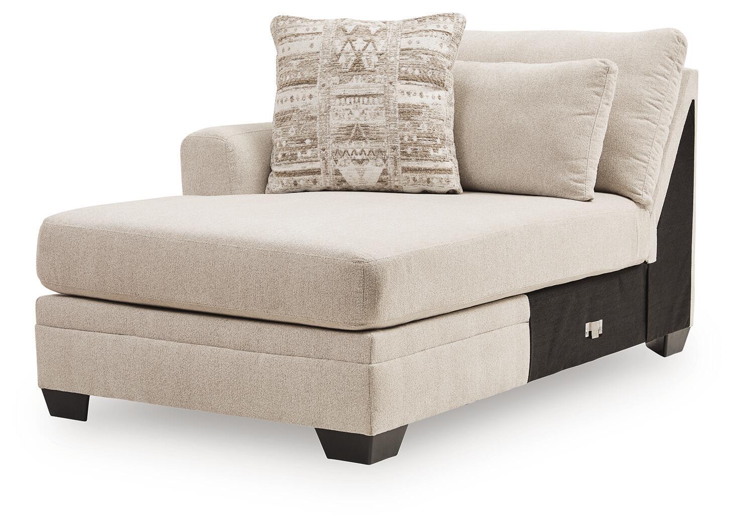 Beige LAF corner chaise with tufted backrest and patterned lumbar pillow