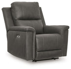 Power recliner with adjustable headrest in dark gray, padded armrests, side view