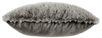 Dark gray faux fur pillow with textured front and visible smooth backing.