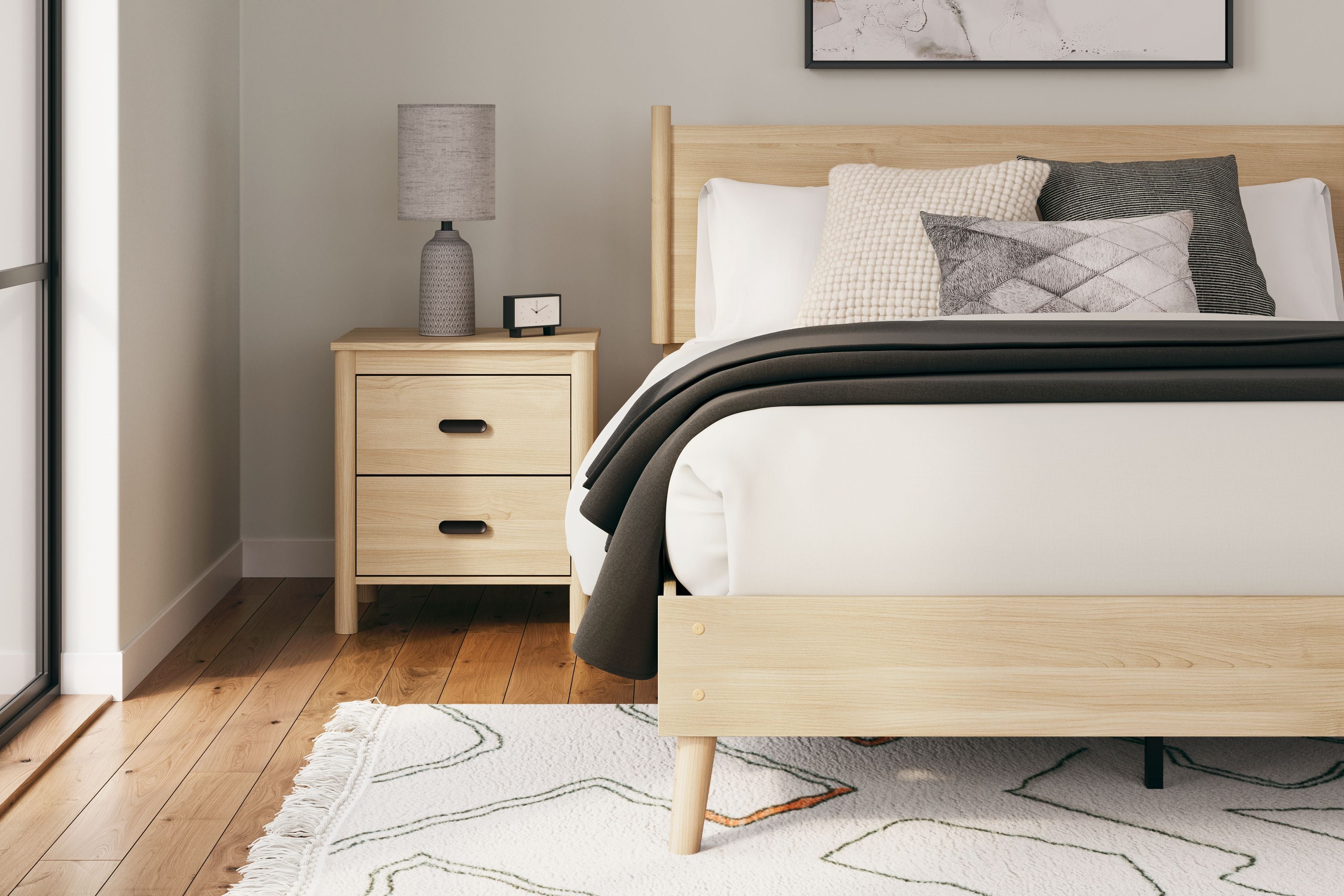 Tan queen panel headboard on bed frame with gray accent pillows and throw