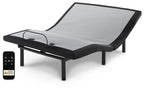 Black adjustable bed base with remote control, head and foot lift