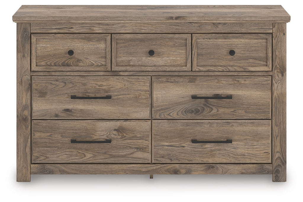 Light brown dresser with seven drawers and metal bar handles
