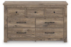 Light brown dresser with seven drawers and metal bar handles
