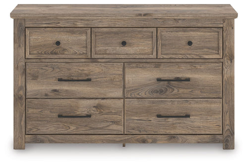 Light brown wood dresser with six drawers and dark metal bar pulls