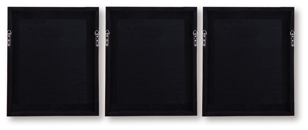 Set of 3 wall art frames showing dark backs with hanging hardware