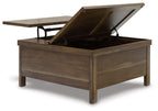 Lift-top cocktail table in grayish-brown wood with raised tabletop showing interior