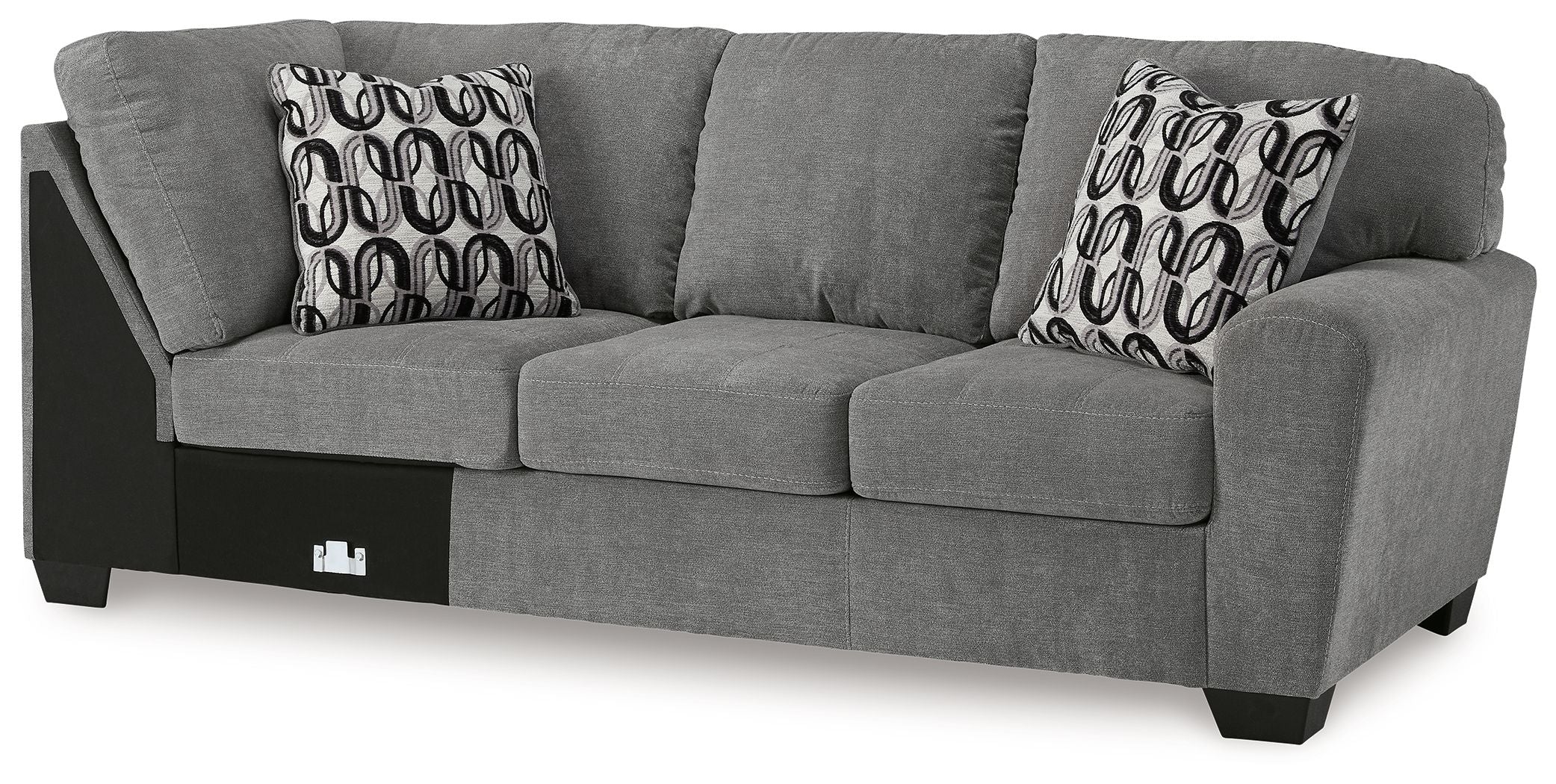 Gray fabric 3-seat sofa with corner wedge, square arms, and patterned throw pillows