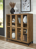 Gray-brown wooden accent cabinet with four doors, curved metal knobs, and shelves